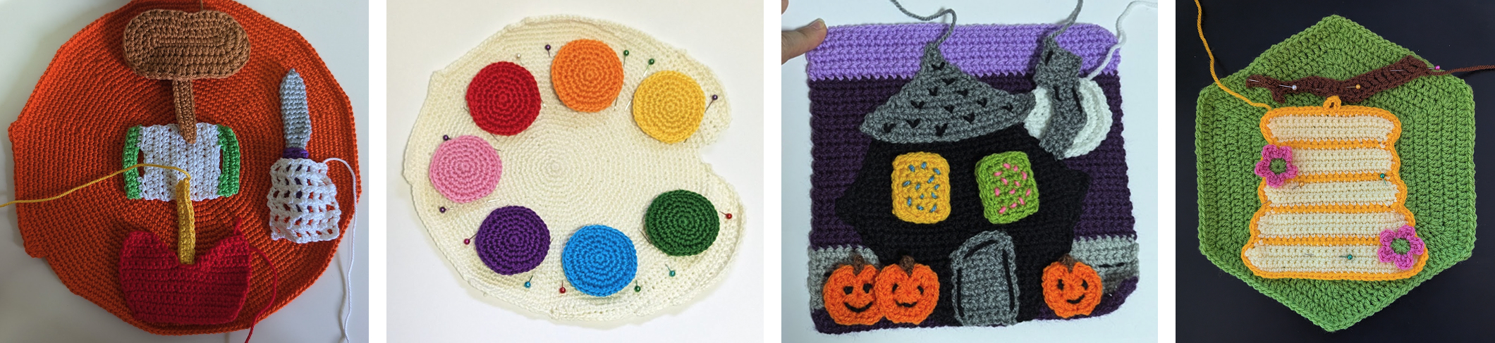Finished quiet book pages with all pieces sewn on: a toolbox page, a Painter palette with pinned color circles, a haunted house scene, and a page with a hanging scroll
